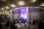 An audience listens to a speaker during the Founder's Dinner