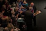 An audience listens to a speaker during the Founder's Dinner