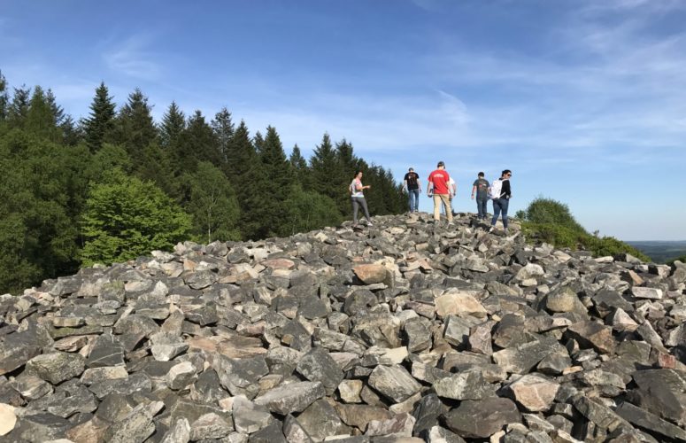 Students on top of rocks during a hike