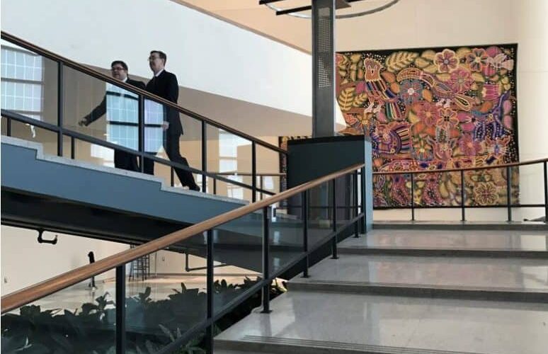 Stairwell with mural in background