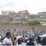 Crowed scattered around the outskirts of a city