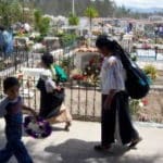 Mother and her children walking