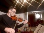 A student plays violin FMU Recording Studio