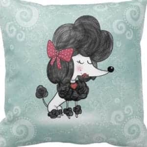 aqua pillow with drawing of a poodle on it