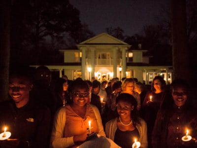 Students holding candles at MLK celebration
