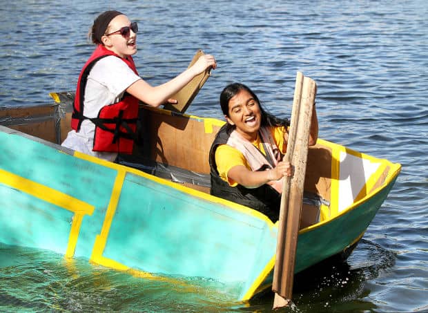 Students participating in boat race