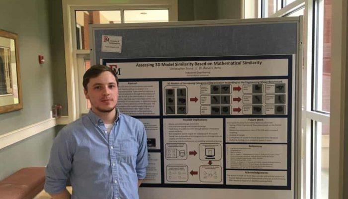 Sousa posed with his research board