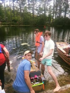 Students with their boat