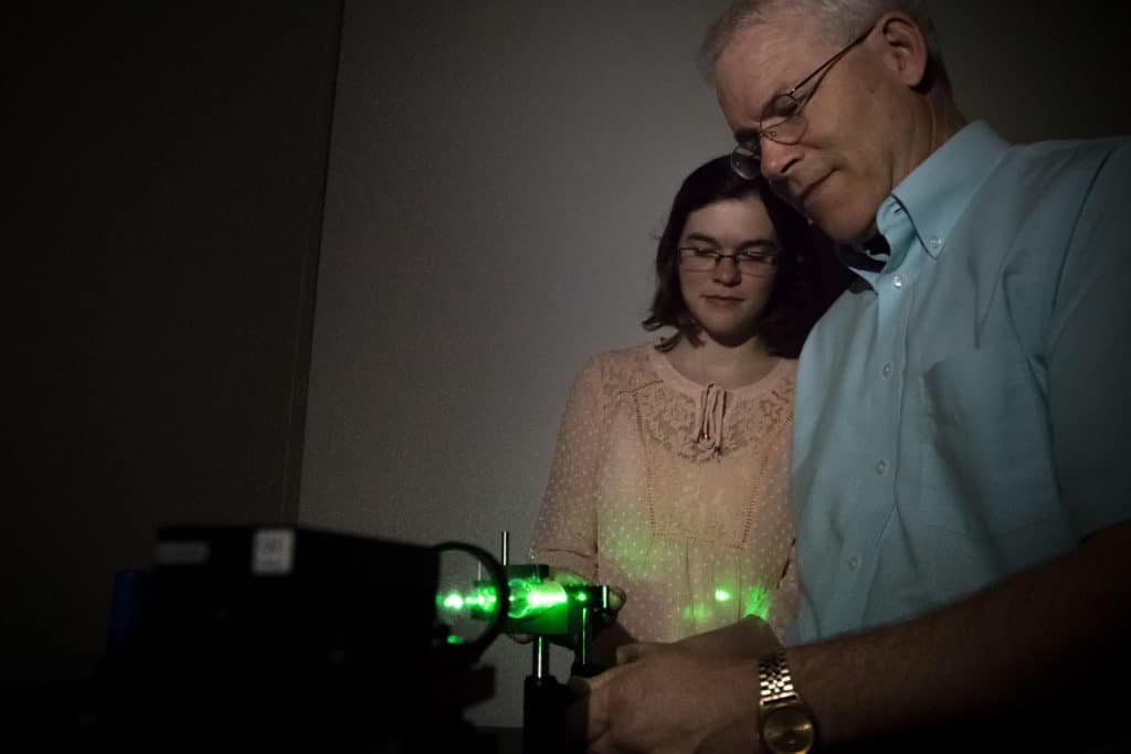 LaserSethMary Student and professor working in class