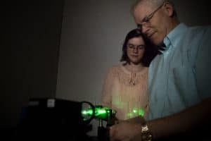 Student and professor working in class