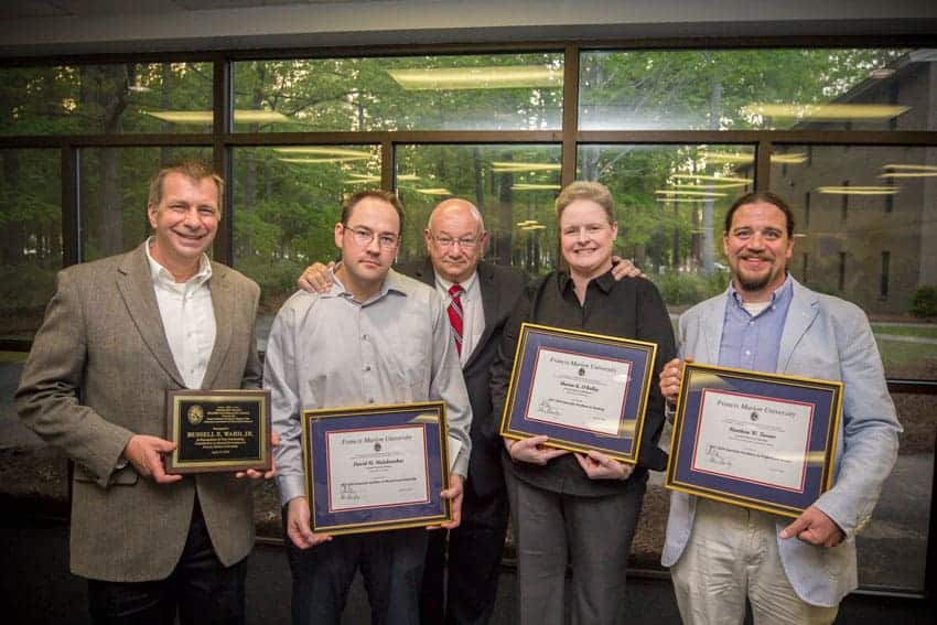 Four FMU professors honored for teaching, service, research, governance