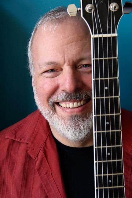 Mike Keneally poses with his guitar.