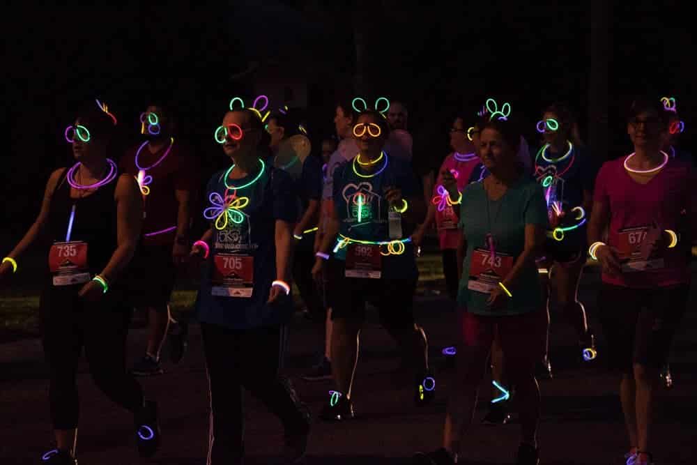 Runners wearing glow sticks for FM A'glow.