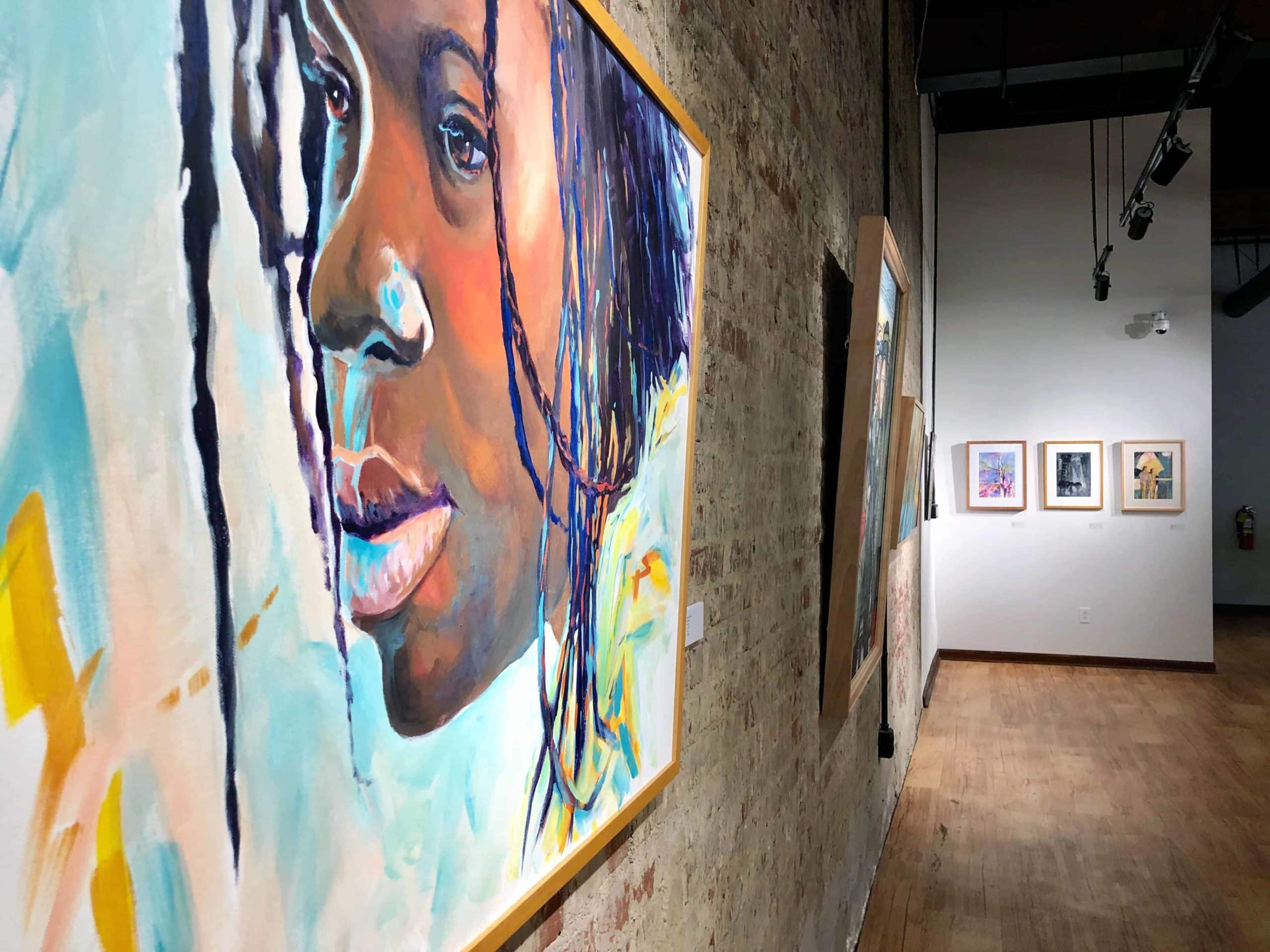 Paintings adorn the walls of University Place Gallery.