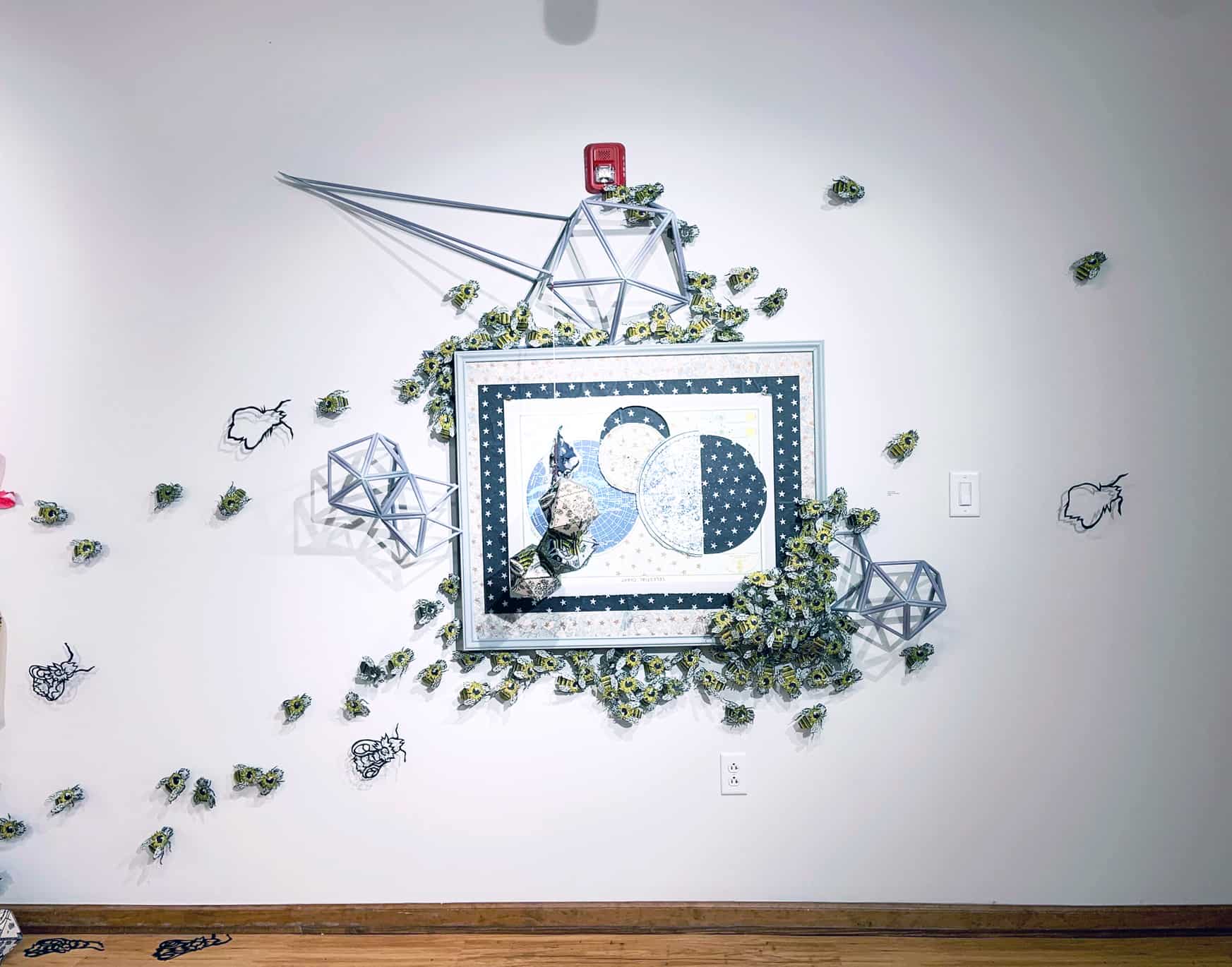 An art installation features bees.