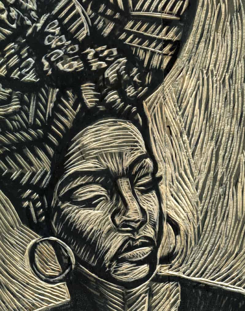 A woodcut piece depicting a woman.