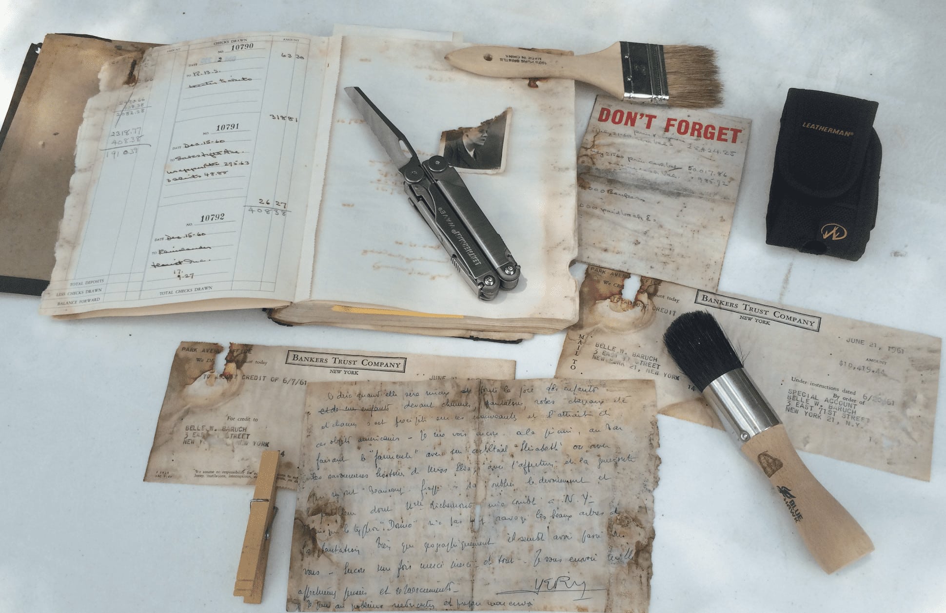 Old documents and a set of restoration tools.