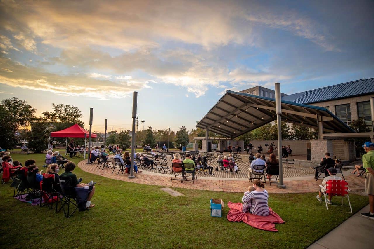 Attendees enjoy a performance at the PAC amphitheater.