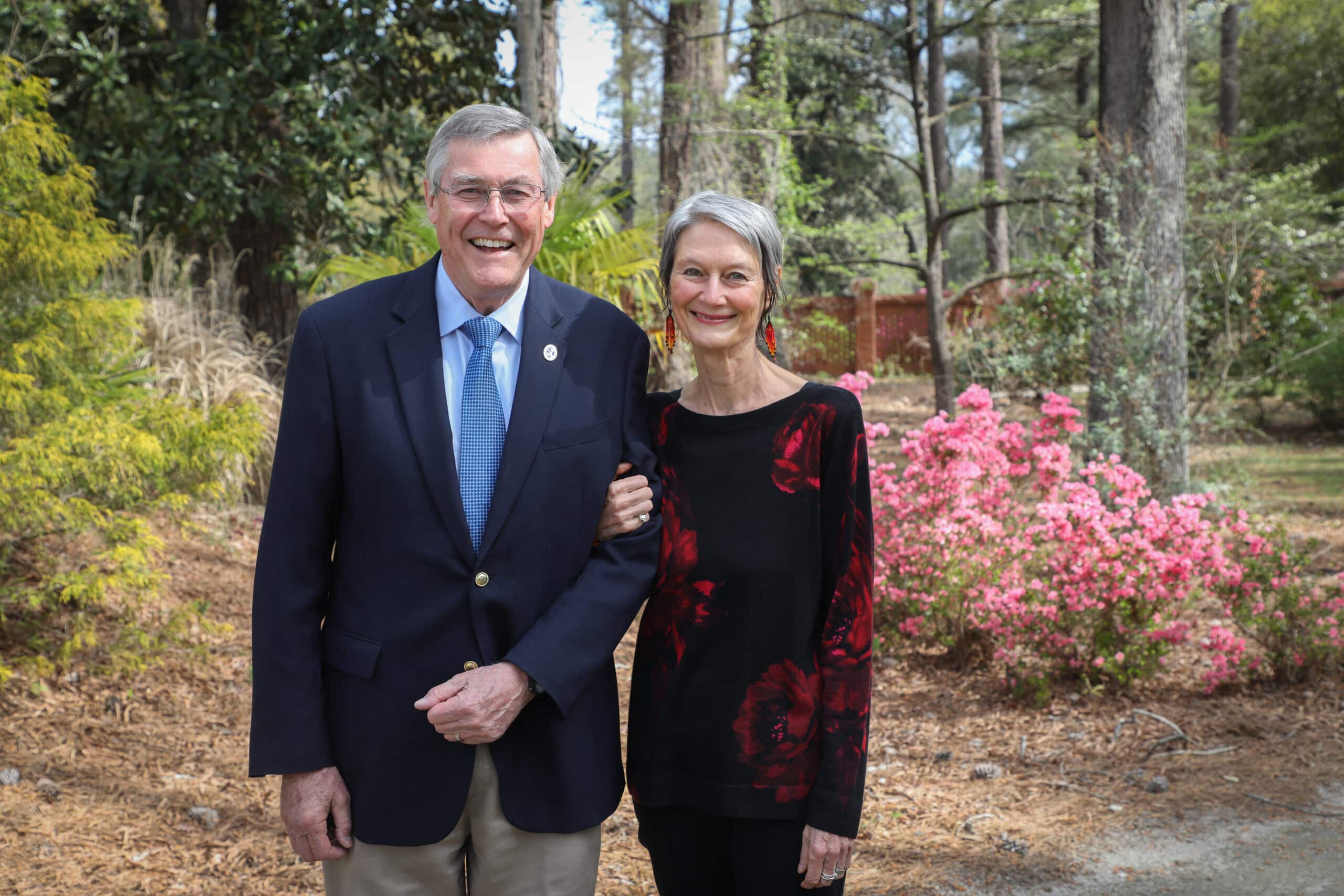 man and woman smiling