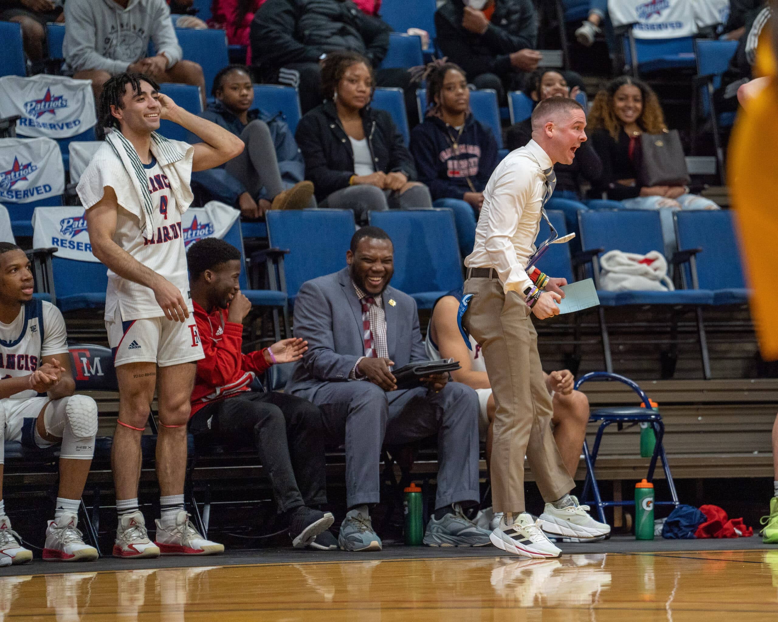 man screaming at basketball game