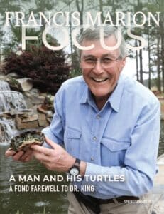 man holding turtle